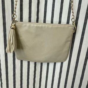 White purse with gold chain